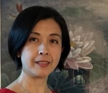Headshot of Adele Zhang smiling