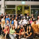 Photo of student in the lobby of the International Center at UC Davis smiling