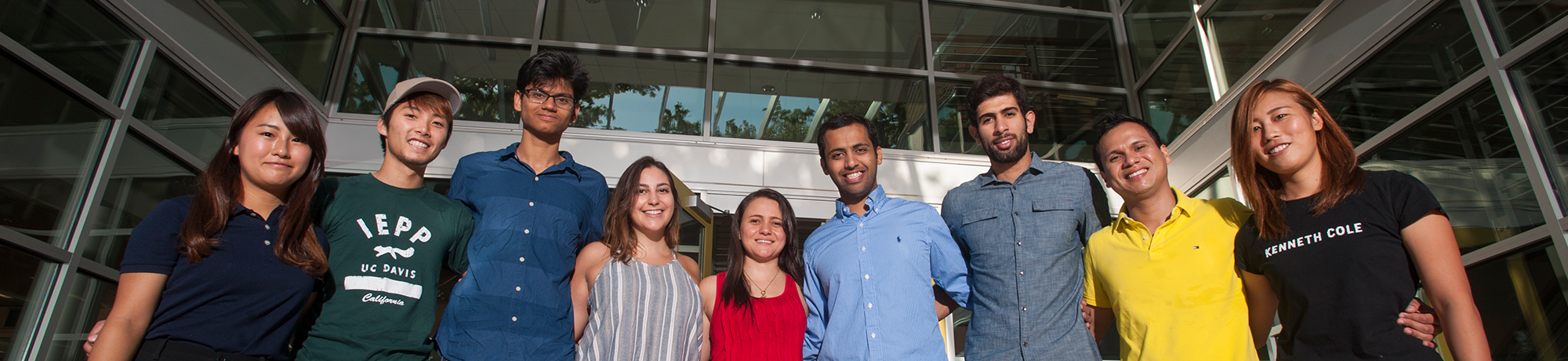 a group of young diverse students looking at the camera